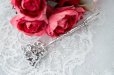 画像1: ヴィンテージシルバー 純銀製(835) 薔薇とお花 透かし細工 ペイストリートング (1)